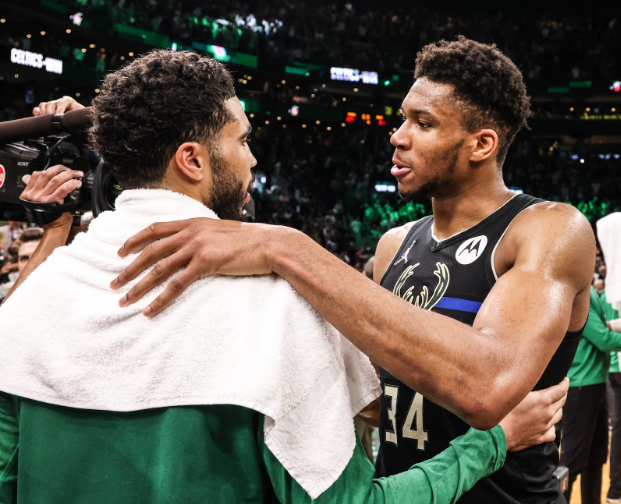 NBA stars Tatum, left, and Antetokounmpo, right, share a postgame embrace.