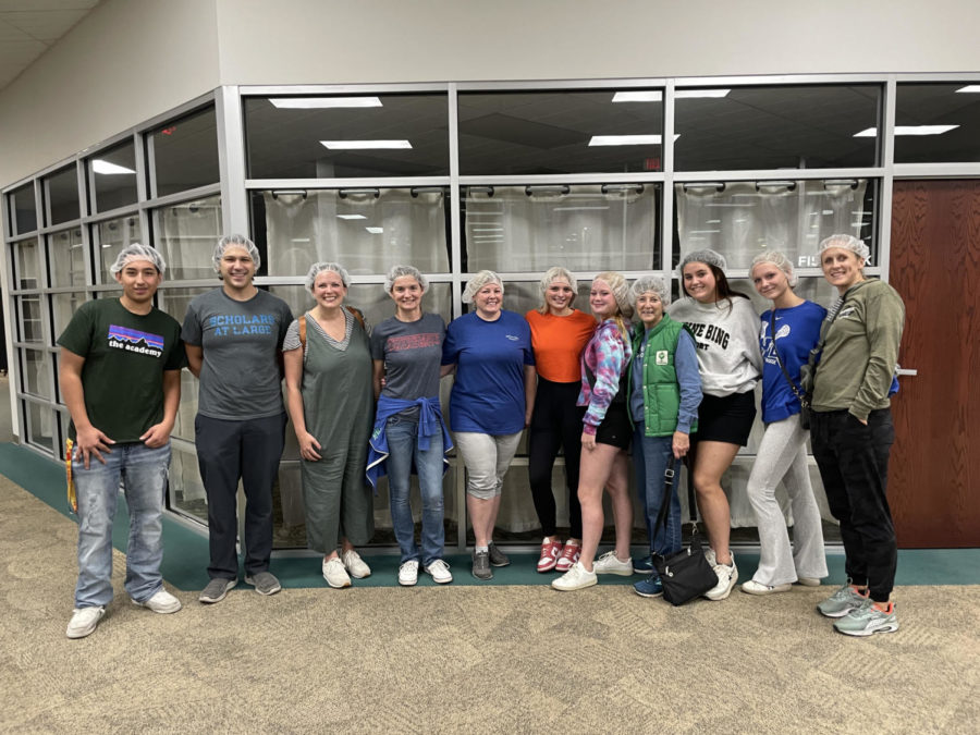 NDA Students, Staff Join Volunteers Packing Meals for Hungry Children